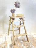 Folding step ladder with chippy paint