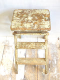 Folding step ladder with chippy paint