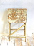 Folding step ladder with chippy paint