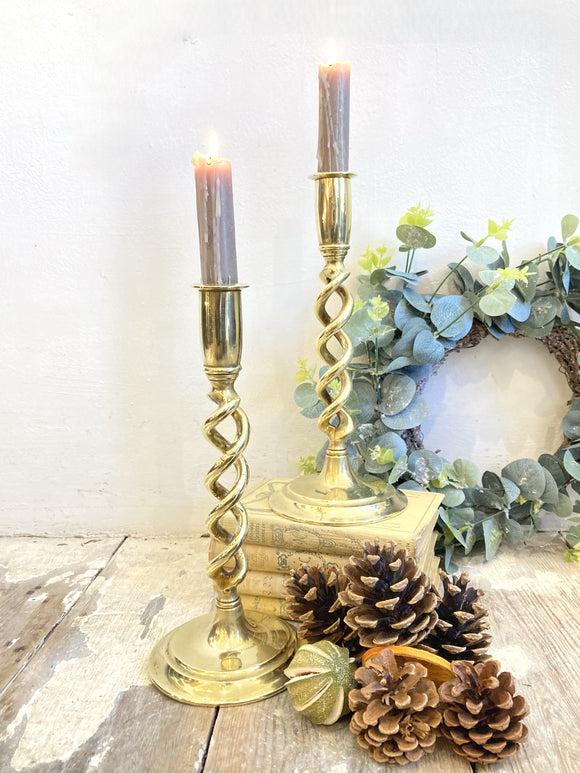 Pair of antique brass spiral candlesticks