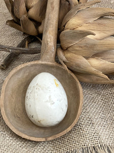 Antique glazed broody egg