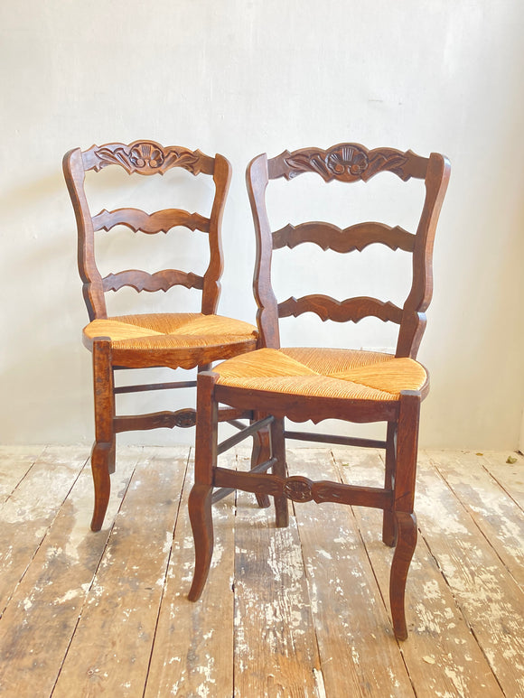 Pair of vintage French rush-seated chairs